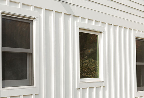 Side of White House with Fiberglass Window Replacement in Marietta, GA
