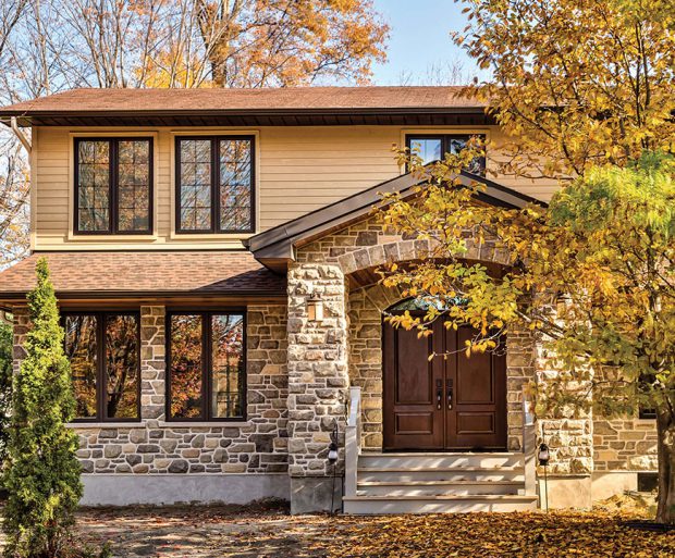 Brick Home with Black Trimmed Vinyl Window Replacement in Kennesaw, GA
