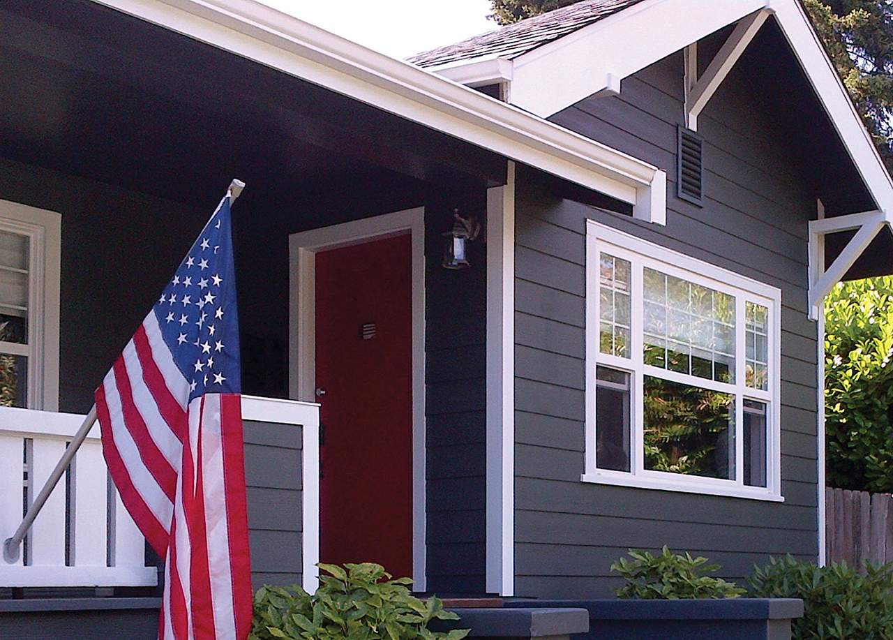 Home exterior with siding replacement by Peach State Windows