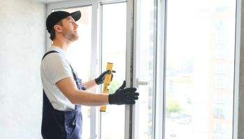 Contractor Performing a Window Replacement at a Home in Woodstock, GA